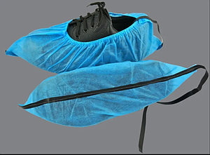 ESD SHOE COVER WITH CONDUCTIVE STRIP